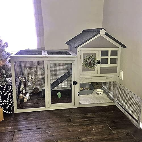 Grey outdoor coop with wire run — photo 3