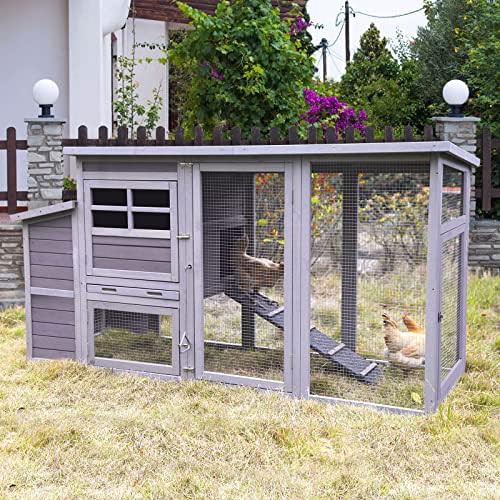 Multi-level wooden chicken coop with run and ramps — photo 5