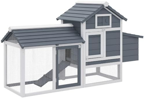 Small white wooden coop with nesting box