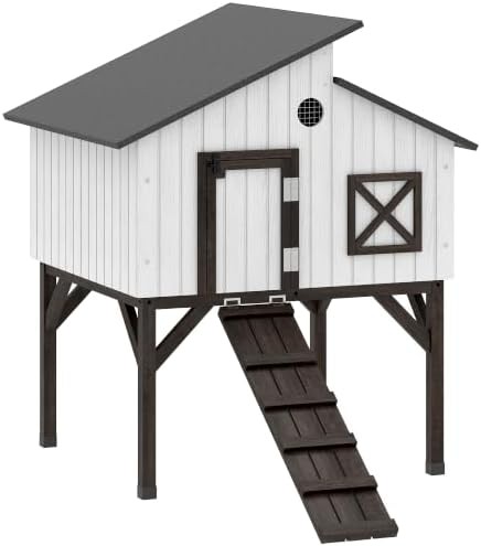 Elevated wooden hen house with nesting box