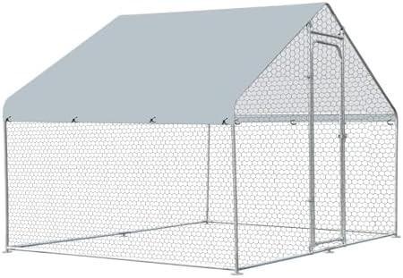 Large metal walk in run with spire roof