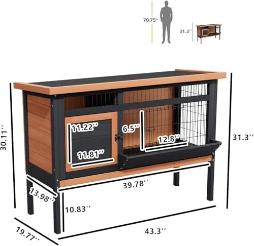 Elevated wooden hutch with pull out tray — photo 3